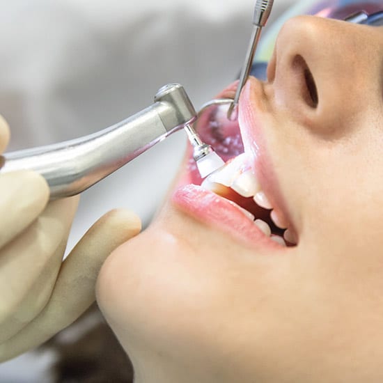 woman having a dental cleaning