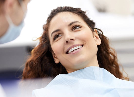 woman smiling in dental chair