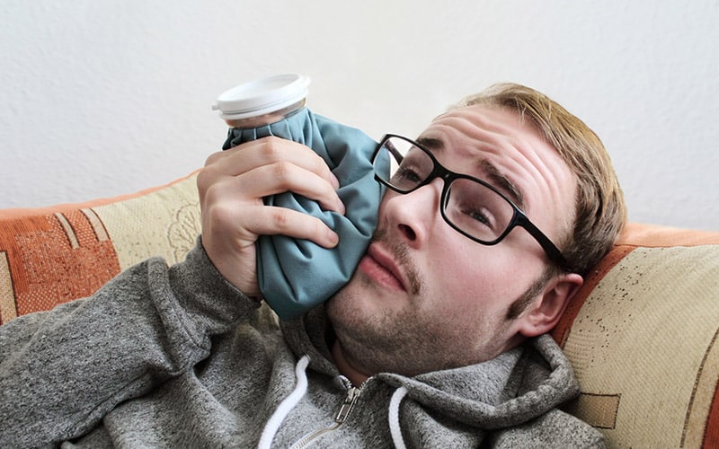 man with toothache