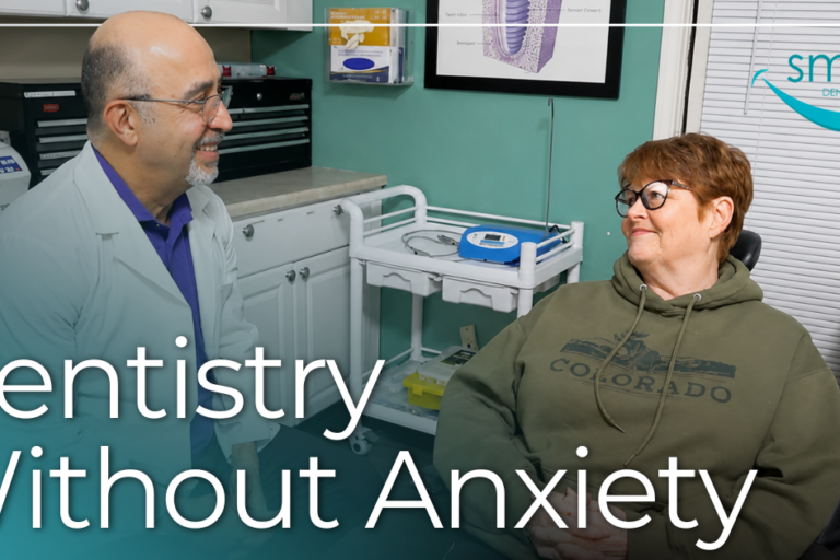 Dentist smiling at patient